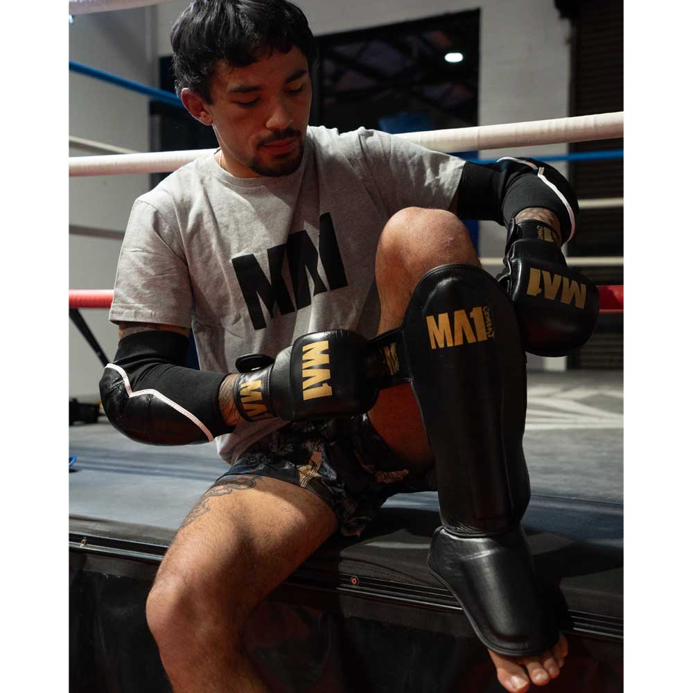 MA1 Black Gold Leather Shin Guards